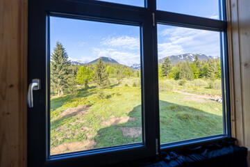 Summer window view to the mountain landscape. spitz mountain view. Pip Ivan peak. Sunny cloudy day in summer, Marmarosy ridge, Carpathian, Ukraine