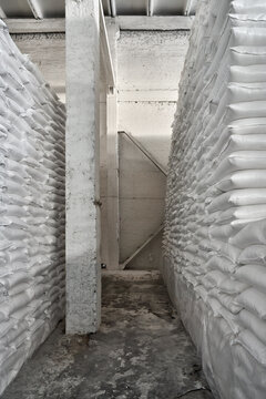 Large heaps of loaded bags at storage