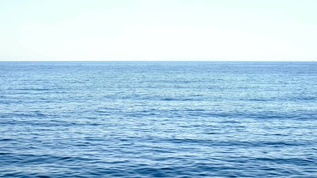 blue sea waves in a sunny morning near Mochigahama, Beppu city, Oita, Japan