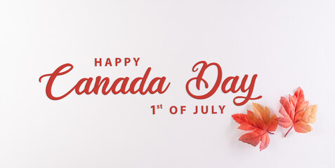 Fototapeta na wymiar Happy Canada Day; sign and symbol concept made from red silk maple leaves on white background with the text.