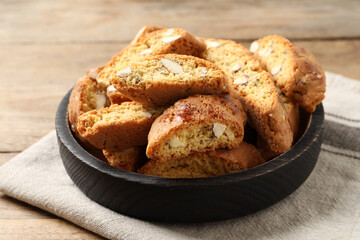 Traditional Italian almond biscuits (Cantucci) on wooden table