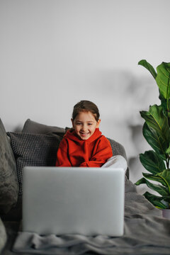 Little Girl Watching Cartoon