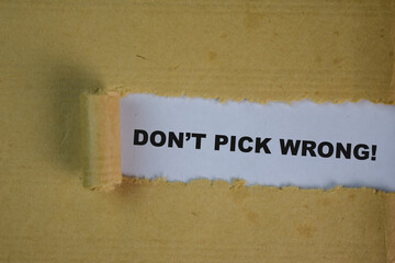 Don't pick wrong Text written in torn paper