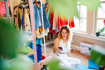 Small Business Owner Working In Vintage Clothing Shop