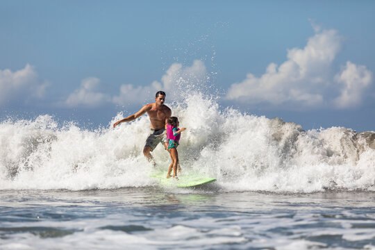 Family Surfing Together 