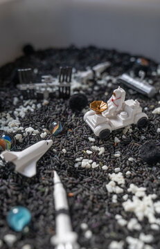 little kid outer space themed sensory bin  