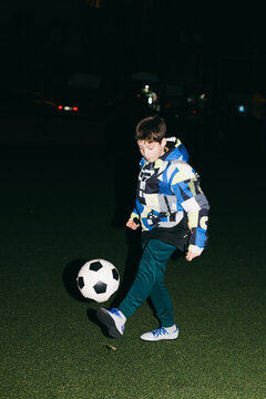 Kid Playing Football
