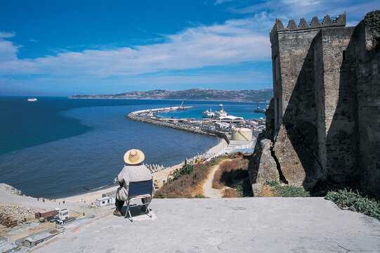 person looking at the view of a port