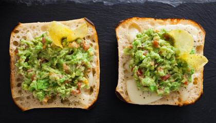 healthy breakfast. toasted italian ciabatta bread with melted cheese and avocado puree