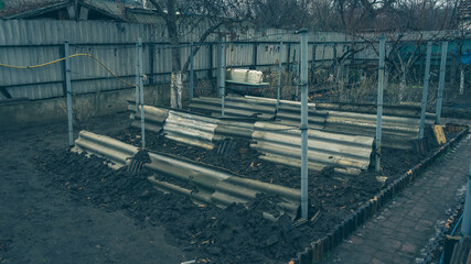 Shelter for grapes in the winter in the home garden.