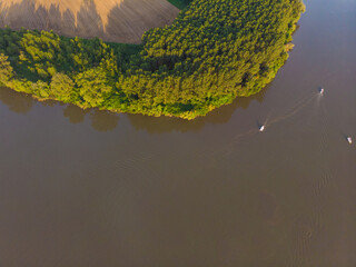 River with boats on the Tisza. Aerial photography. Concept for tourism and travel.