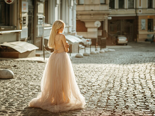 Portrait of an elegant pretty woman wearing grey wedding dress and posing