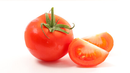 fresh tomato and slice isolated on white background