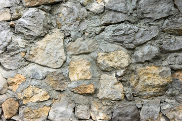 The old stone wall texture.