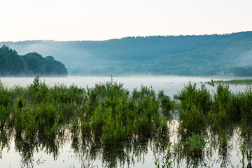 Beautiful rural landscape in Europe, Amazing nature in summer with green fields and blue sky.
