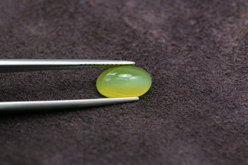 Natural mined oval cabochon shaped, polished lemon yellow color cat's eye optical effect rare loose...