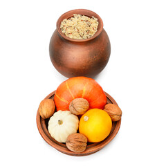 Rice, pumpkins and walnuts isolated on white. Concept - healthy organic food.