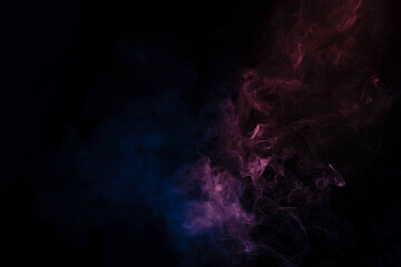 Blue and pink steam on a black background.
