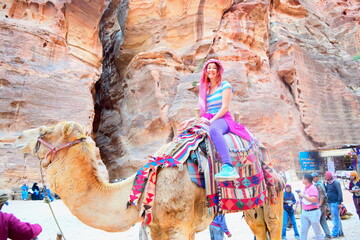 woman holiday visit jordan petra camel
