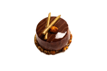 Chocolate and caramel cake isolated on a white background.