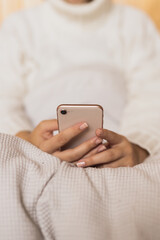 close up of a person holding a smartphone
