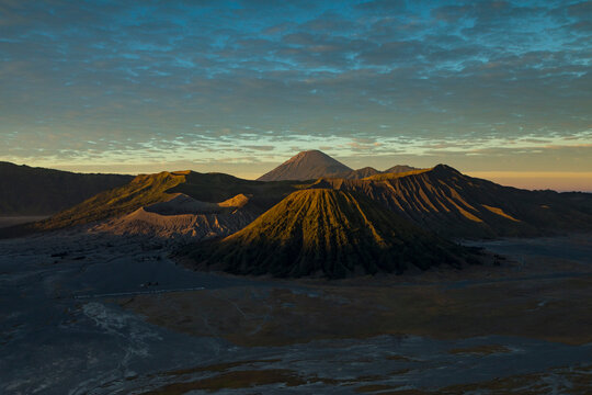 Bromo active volcano landscape at sunrise, behind the Tengger massif, seen from the King Kong Hill viewpoint in East Java, Indonesia