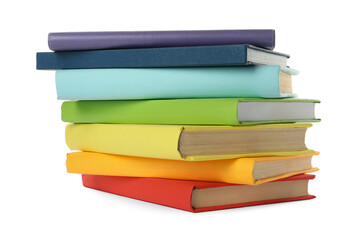 Many colorful hardcover books on white background