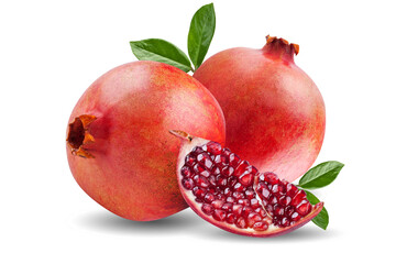 A ripe pomegranate with seeds and leaves. Background with pomegranate fruit. Pomegranate fruit on a whitebackground.