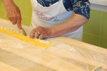 Preparation of agnolotti. Typical pasta of the Langhe, Piedmont - Italy