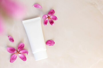 white cosmetic tube for face cream, hand cream, body lotion or cleanser. Sensitive skin cosmetic product concept, copy space