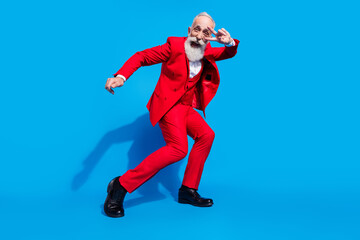 Full length photo of senior man happy positive smile show peace cool v-sign dance party isolated...