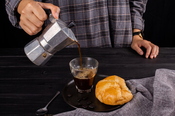 person holding a cup of coffee