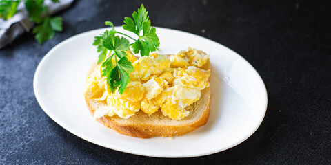scramble fried egg scrambled breakfast dish on the table healthy food meal snack copy space food background rustic. top view