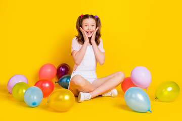 Full length body size photo schoolgirl at party amazed overjoyed with balloons isolated vibrant...