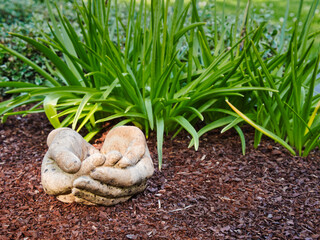 A statue of received hands