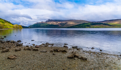 A panorama view along shore of Loch Lomond in Scotland on a summers day