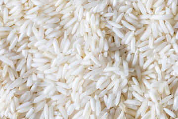 Jasmine rice,Top view of white rice seed texture background. Organic, natural long rice grain