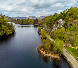 Fototapeta na wymiar An aerial view across the eastern end of Loch Katrine in the Scottish Highlands on a summers day