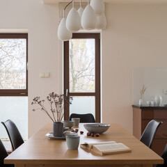 Dining room with long wooden table