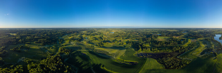 Beautiful aerial panoramic photo of Lithuania country side during summer sunset.