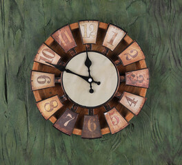 old wooden clock on a wooden wall