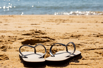 Brazilian Beach Coast. Slippers in Sand and Sea Background