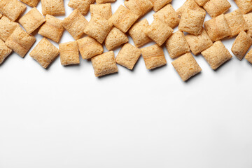Delicious corn pads on white background, top view