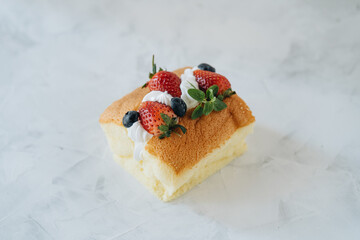 Biscuit with whipped cream and berries
