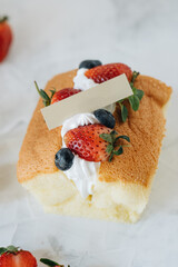 Biscuit with whipped cream and berries