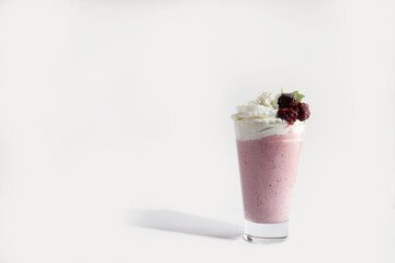 milkshakes in a glass with whipped cream and mint. Smoothie. on white background