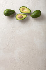 Avocado on light concrete background