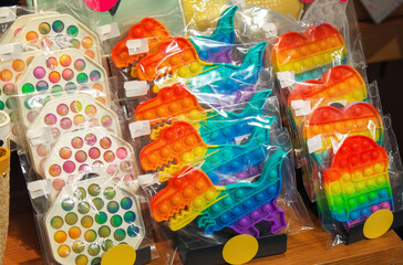 Colorful antistress sensory toy, fidget bubble push "Pop it" in the shop.