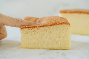 Female hands holding soft biscuit