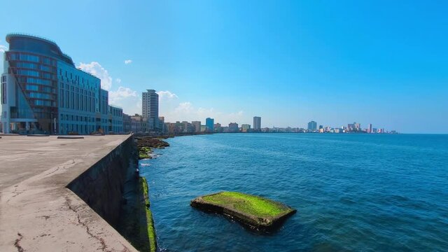 EL Malecon, Avenida de Maceo street, a broad landmark esplanade that stretches for 8 km along the coast in Havana past major city tourist attractions.